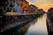 Holidays in Italy - Naviglio Grande canal in Milan in sunset