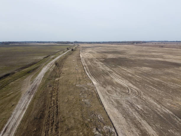 istock Dirt road in the fields, aerial view. Landscape. 1949634417