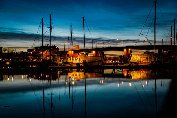 istock View of ships docked in a harbour at evening 1949635228