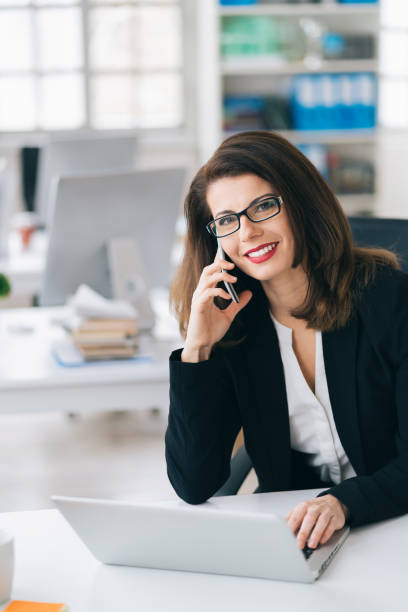 istock Businesswoman portrait at her workplace 1949652629