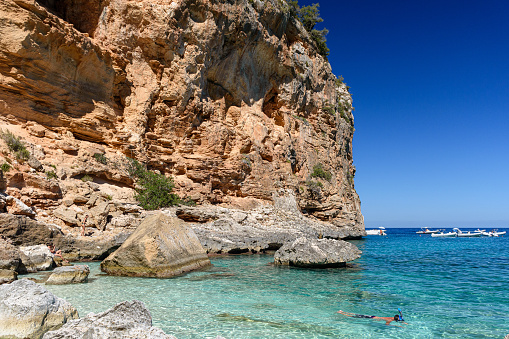 The cliffed coastline and the sea in Cala Biriala, a bay in the Orosei gulf in east Sardinia