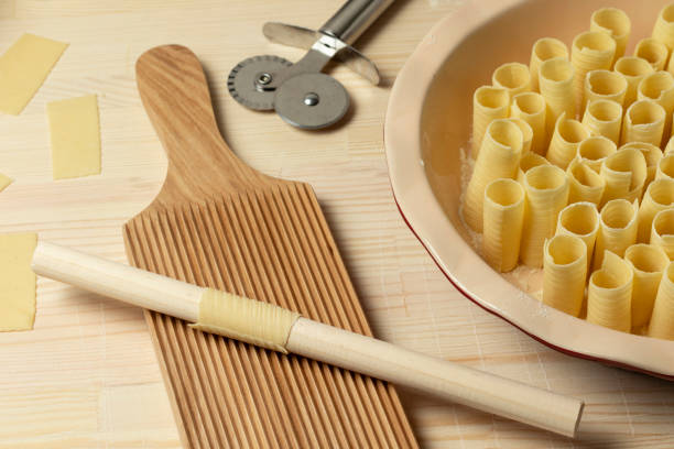 Making fresh rigatoni pasta at home. Top view.