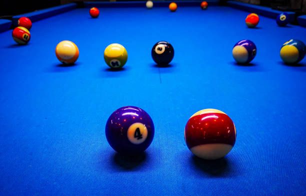 istock Pool table with ongoing game and multiple balls. blue table. Vivid colors. 1949700984