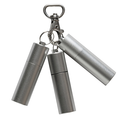 Set of three round stylish USB flash drives with a metallic casing, connected to a carabiner. Isolated on a white background.