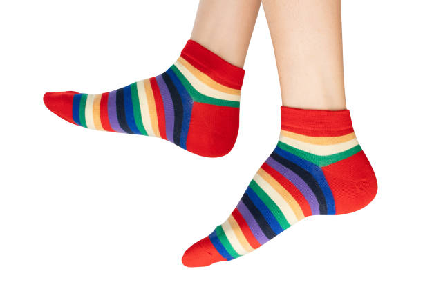 istock Clipping path, woman wearing colorful socks on isolated white background. 1949730071