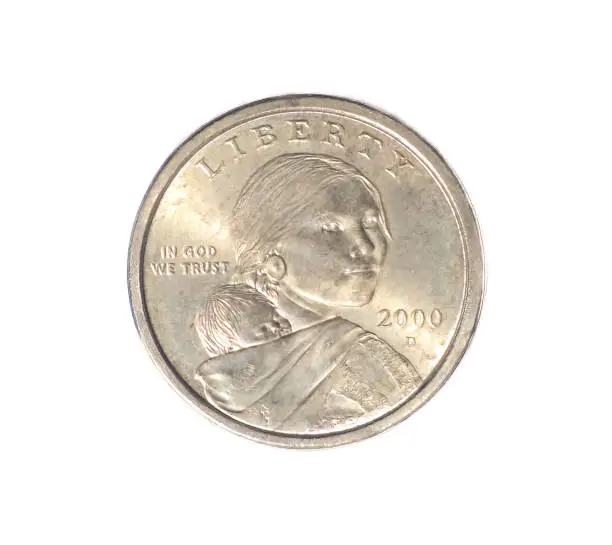Photo of Rare gold color 2000 D Sacagawea Dollar Coin from Denver mint.  Obverse front side isolated on white background. She was a Lemhi Shoshone woman who helped the Lewis and Clark Expedition in Louisiana