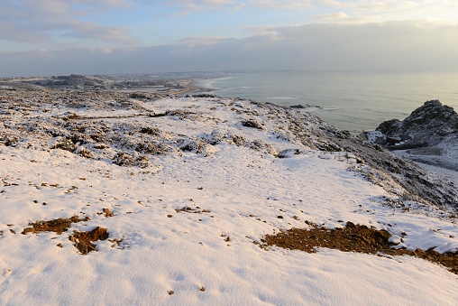 Rare appearance of snow and sunshine at St.Ouen's Bay.