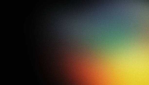 istock Grainy background dark abstract orange yellow green glowing blurred noise texture black backdrop copy space wide banner header poster design 1949808333