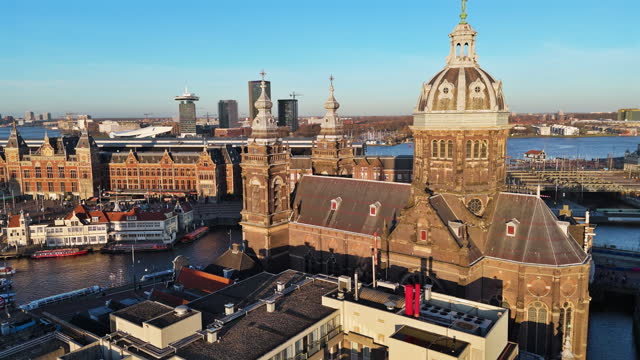 Aerial view of Amsterdam Saint Nicholas basilica at sunset, A Church in Amsterdam, St. Nicholas Church in Amsterdam, Church of Saint Nicholas in Amsterdam