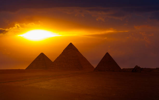 istock Giza Pyramid Complex at amazing sunset - Cairo, Egypt 1949835759