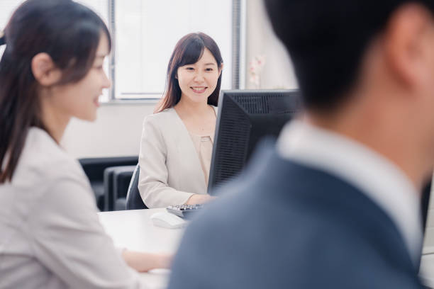 istock Business people working at their desks in a cheerful atmosphere 1949848266