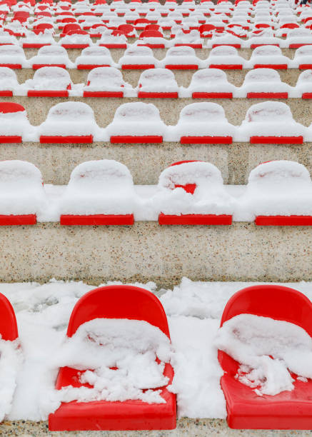 istock Stadium seats covered with snow in January 1949903434