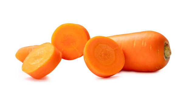 istock Front view of fresh beautiful orange carrot and slices with strange shape in stack isolated on white background with clipping path 1949909882