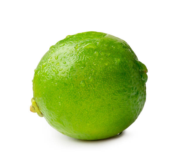 istock Front view of fresh green lemon fruit isolated on white background with clipping path 1949914078