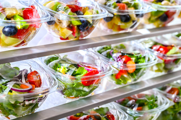 istock Boxes with fruit and vegetable salads in a commercial fridge 1949917795