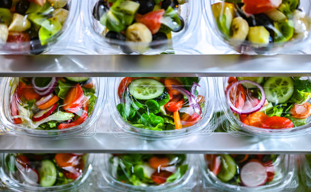 istock Boxes with fruit and vegetable salads in a commercial fridge 1949918833
