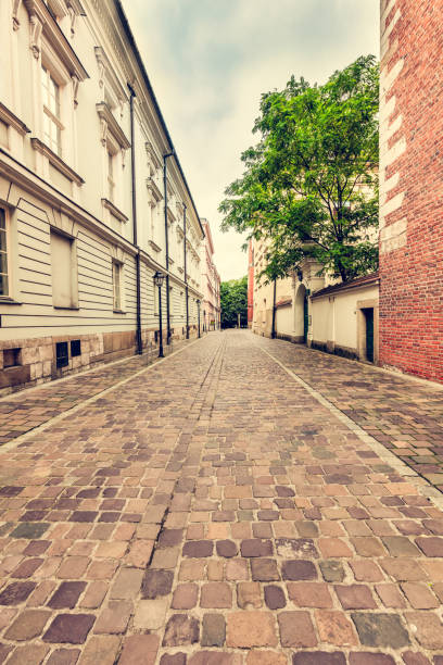 istock Empty cobblestone old town street in Cracow, Poland 1949931105