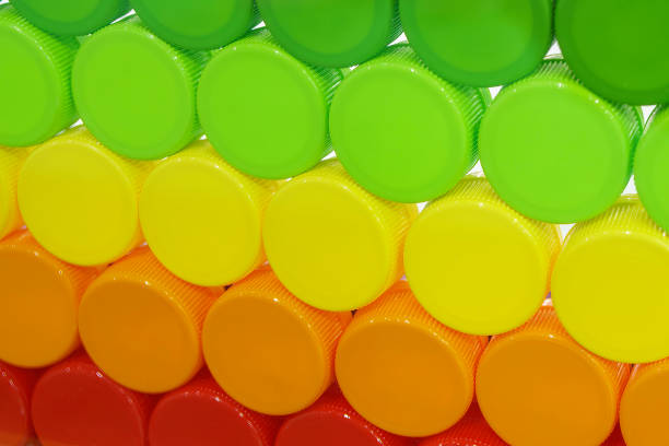 istock Multi-colors background of plastic drinking water caps. 1949955039