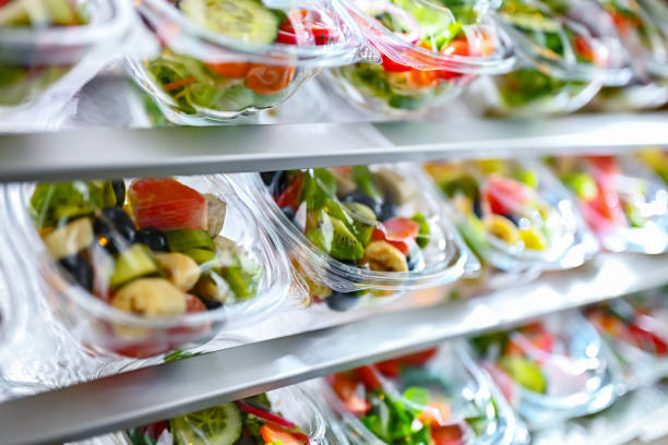 istock Boxes with fruit and vegetable salads in a commercial fridge 1949957168