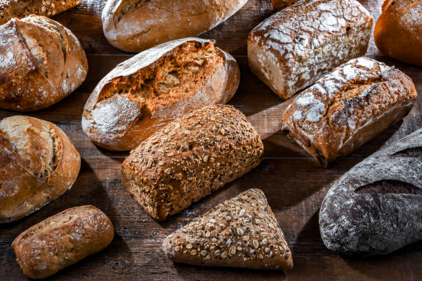 istock Assorted bakery products including loaves of bread and rolls 1949958794