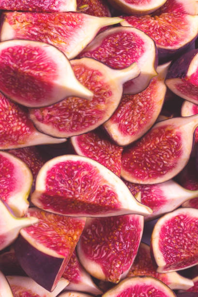 istock Tasty figs background. Top view. 1949959389