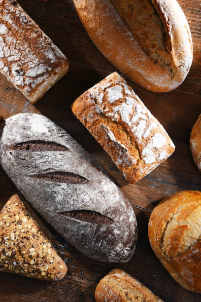 istock Assorted bakery products including loaves of bread and rolls 1949959392