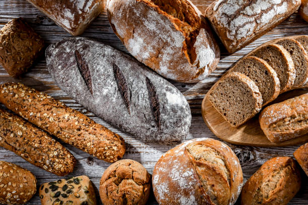 istock Assorted bakery products including loaves of bread and rolls 1949961541