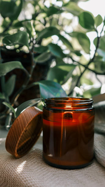 istock Burning candle in a cozy home interior 1949971080