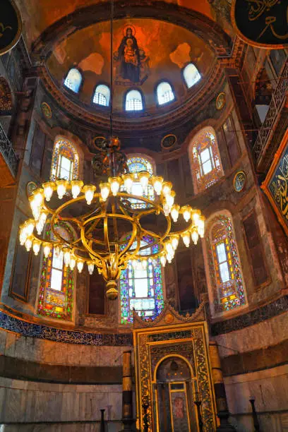 Mosaic of Virgin Mary and Infant Jesus high over the inner sanctum of the Hagia Sophia, landmark 6th centure byzantine church built by Justinian at Istanbul, Turkey