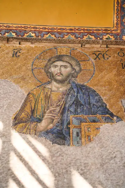 Mosaic of Christ Pantocrator inside the Hagia Sophia - landmark byzantine church built by Justinian in 537 AD in Istanbul, Turkey