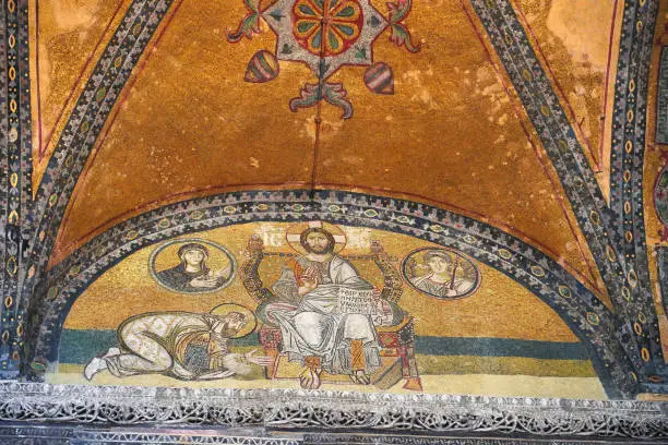 Mosaic Of Emperor Leo VI, 9th cent. AD, bowing to Christ  in the Hagia Sophia, 6th century masterpiece of Byzantine Eastern Orthodox christian architecture in Istanbul,Turkey