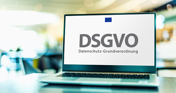 Laptop computer displaying the sign of DSGVO