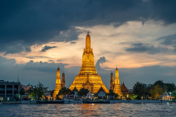 istock Wat Arun Ratchawararam (the Temple of Dawn) at sunset, Bangkok, Thailand 1950055718