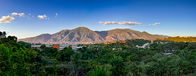 Latin America places video series: Panoramic high angle view of Caracas city valley with El Avila Mountain at the background.