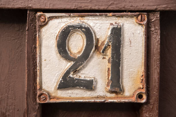 istock Old retro cast iron plate number 21 1950177420