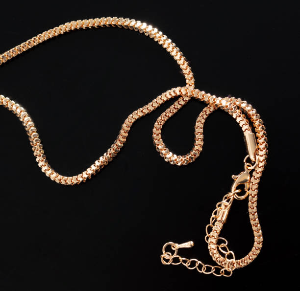 istock Gold chain isolated on black background. Close-up 1950193777