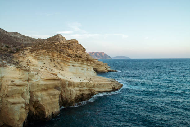 istock Waves hitting the cliffs in Las Negras, Almeria, Spain. 1950203318