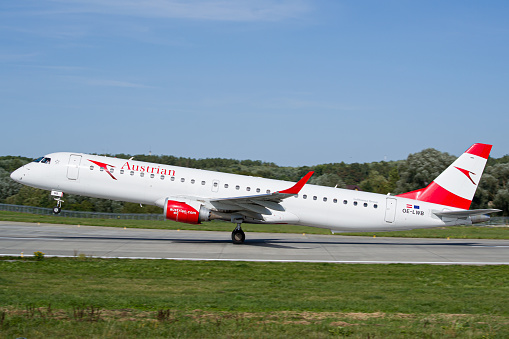 Austrian Airlines Embraer E195 aircraft taking off from Lviv Airport