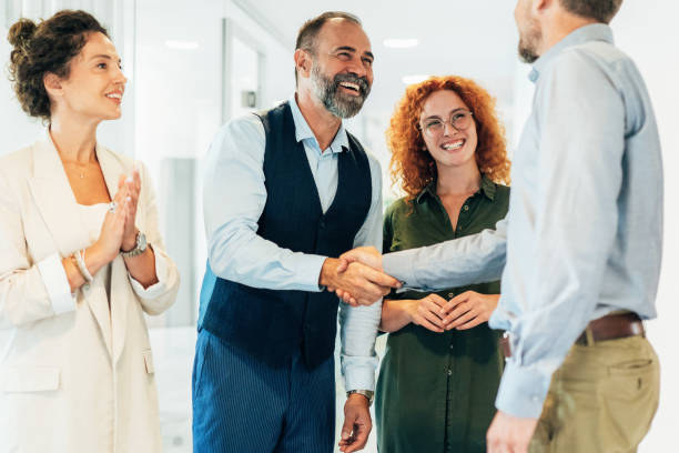 istock Business people shaking hands in the office 1950241814