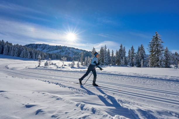 istock woman crosscountry skiing 1950241818