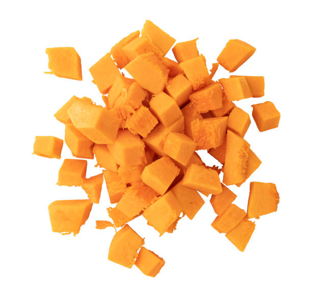 istock pieces of pumpkin isolated on white 1950245632