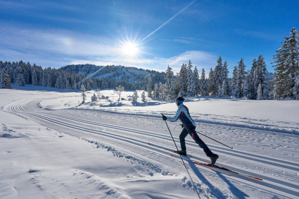 istock woman crosscountry skiing 1950269268