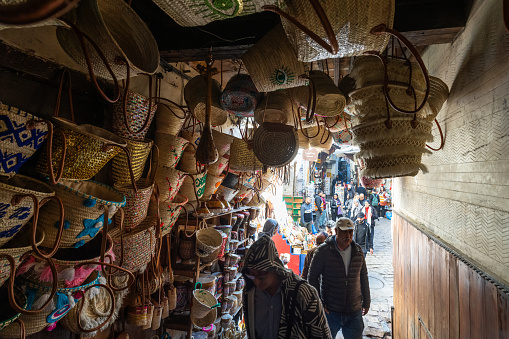 Fez, Morocco - January  01, 2024: Beautiful market street of old medina in Fez, Morocco