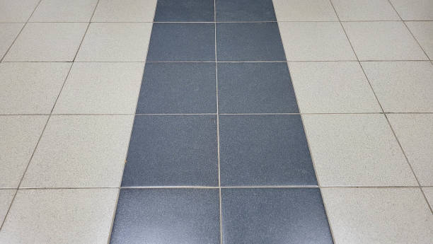 istock Textured modern floors. Square ceramic mosaic with cubic pattern for home, business and bedroom decoration. 1950276570