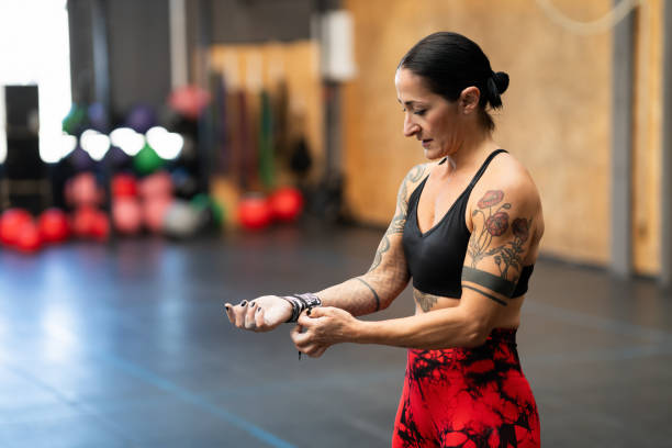 istock Woman protecting her wrist before training in a gym 1950284019