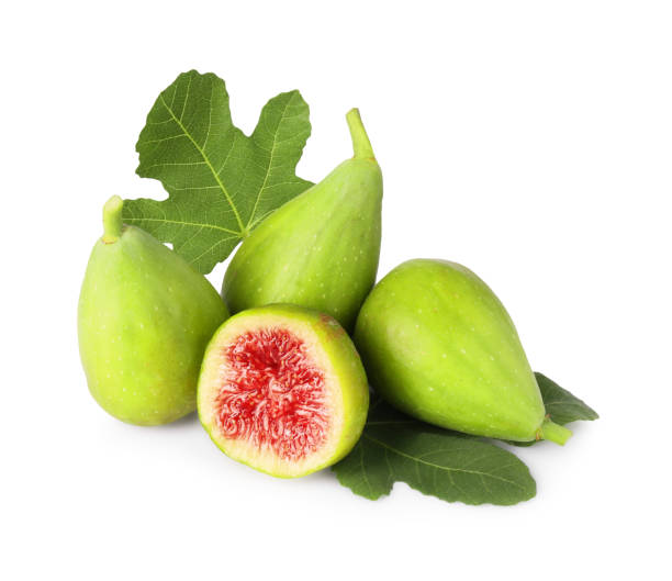 istock Cut and whole green figs with leaves isolated on white 1950289316