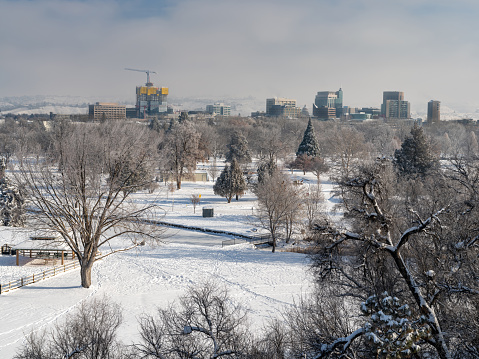 Snow covered park in Boise Idaho with distant skyline