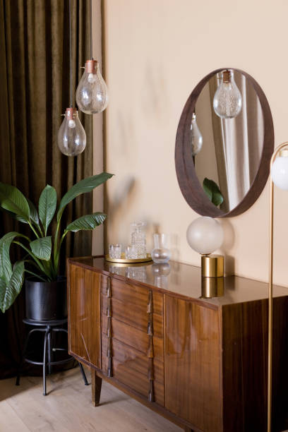 istock Brown wooden cabinet and mirror 1950303638