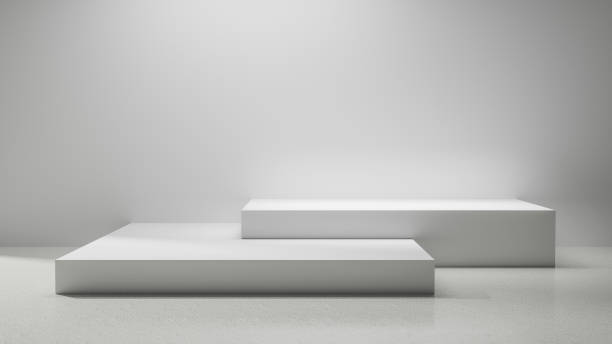 istock Empty copy space podiums with spotlight and blank gray wall and floor, abstract empty space studio room spotlight, product placement display, white empty table, white walls and floor abstract room 1950333042