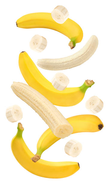 istock flying fresh banana isolated on white background. exotic. tropical. clipping path 1950364396